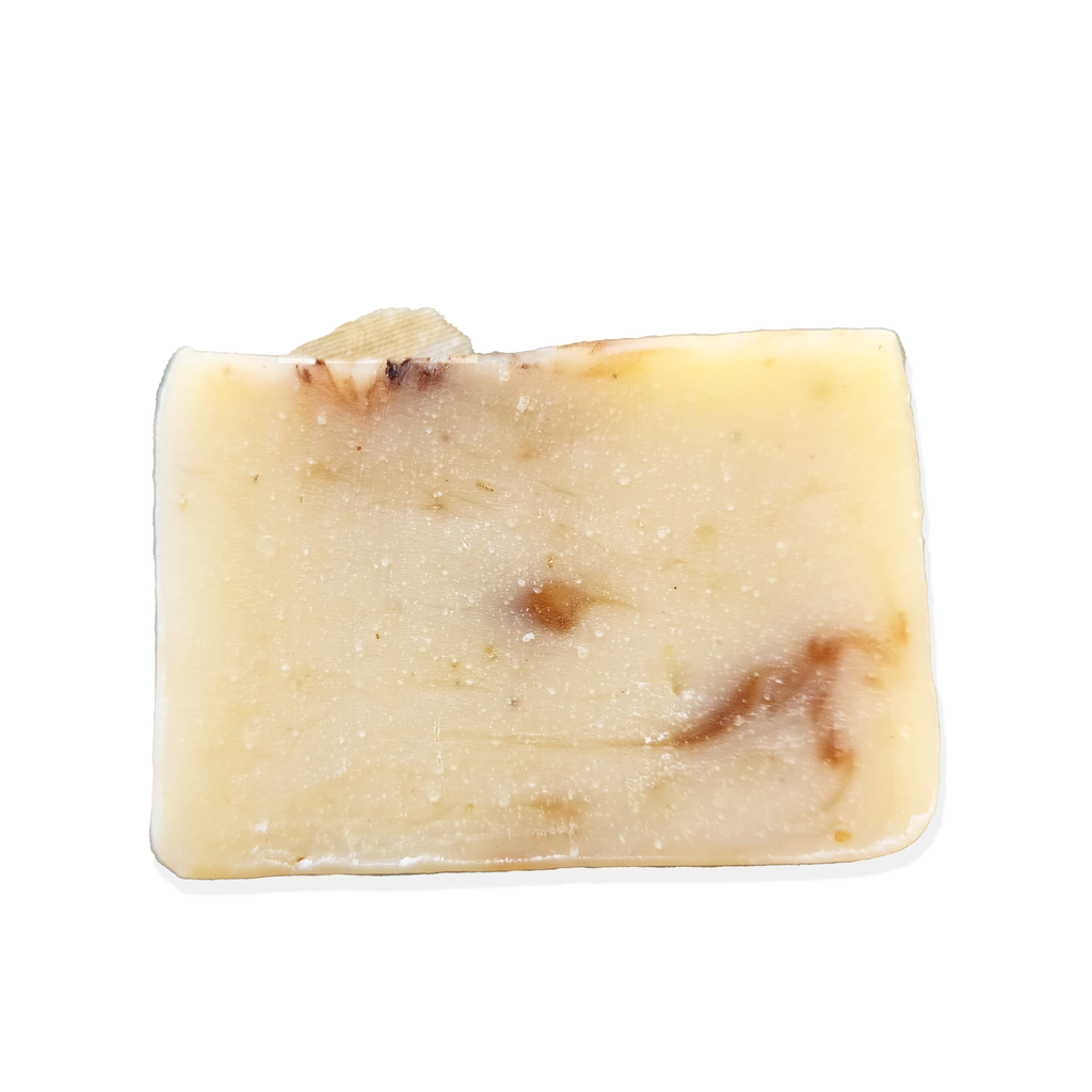 handcrafted shea butter bar soap with certified organic almonds, oats, shea butter, coconut oil and extra virgin olive oil. Made in small artisan crafted small batches, scented with almond.
