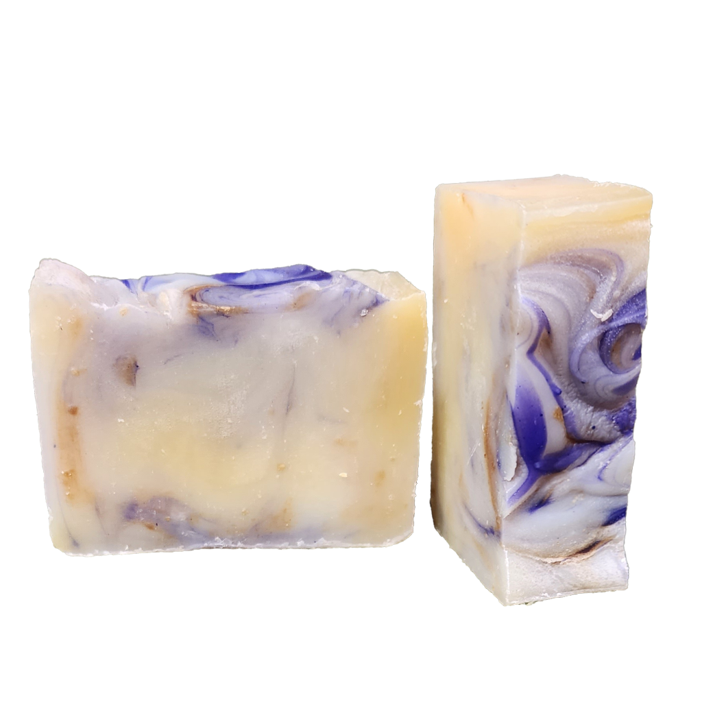 artisan crafted vegan bar soap made with certified organic shea butter, certified organic coconut oil, certified organic extra virgin olive oil and organic therapeutic essential oils of lavender and Roman chamomile infused with certified organic lavender and chamomile flowersa