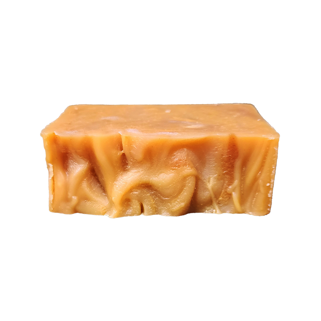 single bar of lemongrass and turmeric organic soap, organic shea butter bar soap scented with natural essential oils of lemongrass and turmeric, infused with turmeric powder, made with certified organic oils and shea butter, cold processed, hand poured, hand cut, handcrafted in the USA, aromatherapeutic organic bar soap