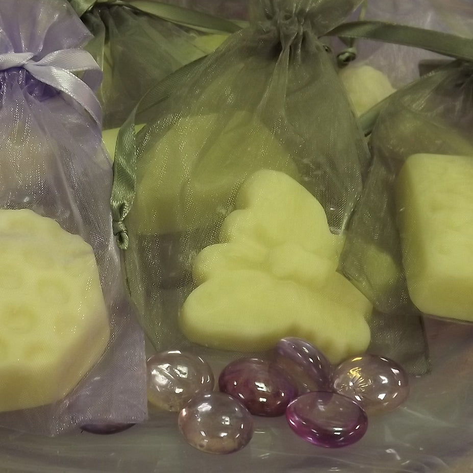 organic lotion bars in different shapes and sizes made with 100% certified organic oils and butters, including shea butter, mango butter and cocoa butter. Pure luxury for anyone.Handcrafted in small batches, vegan, unscented, paraben free, certified organic ingredients.