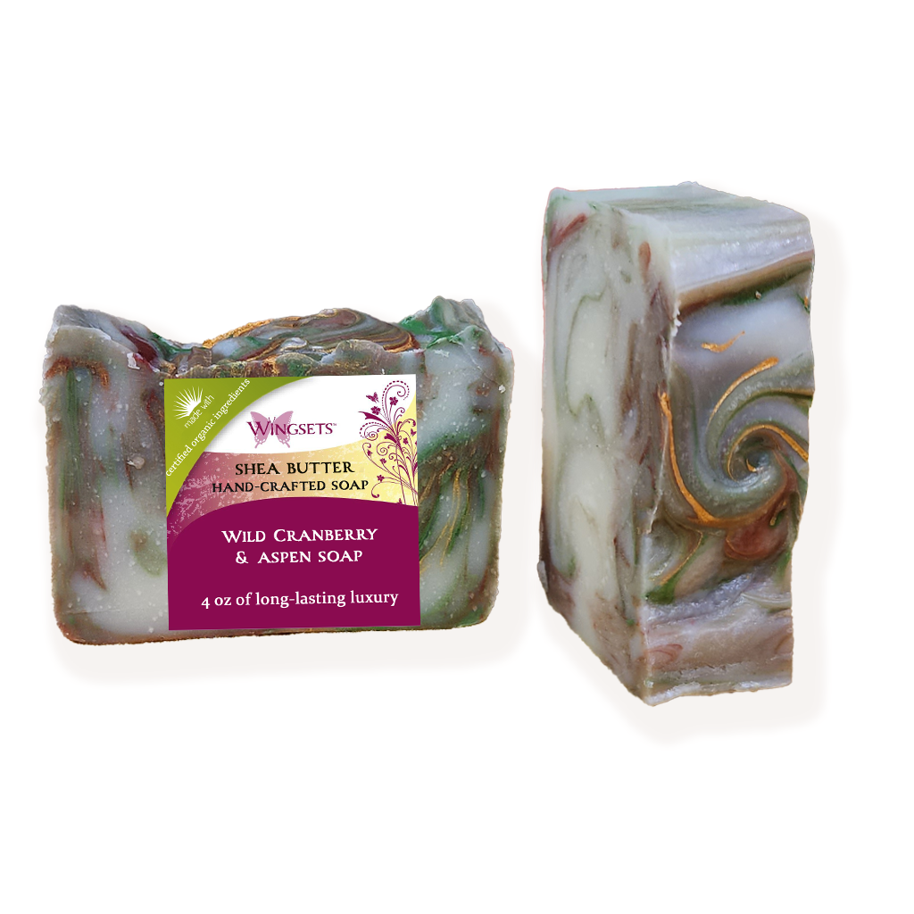 handcrafted cold process soap scented with  a phthalate free fragrance of tart cranberries, woodsy outdoors and clean crisp air, made with certified organic oils and shea butter, natural micas